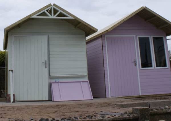Coun Peter Murphy, Councillor Ruth Duff and the previous round of new beach huts in Fleetwood. Coun Peter Murphy, Councillor Ruth Duff and the previous round of new beach huts in Fleetwood.