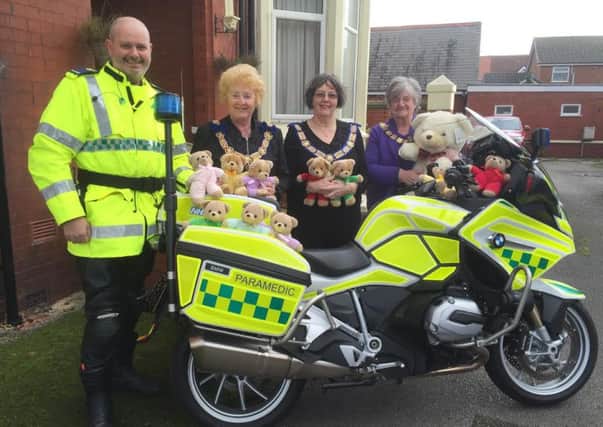 Fylde coast paramedic Chris Veevers takes delivery of TLC teddies donated by members of the Blackpool branch of the Honourary Fraternity of Ancient Freemons. He is pictured with (l-r) Past Provincial Grand Master Heather Hitchen, Provincial Grand Master Pat Rothwell and Deputy Provincial Grand Master Brenda Cook