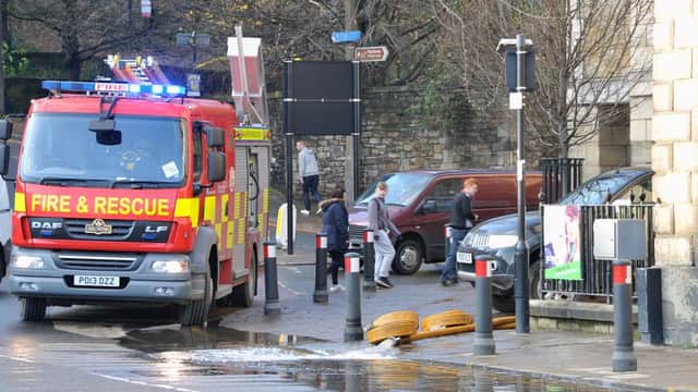 Aftermath of the unprecedented flooding over the weekend in Lancaster.
Firefighters pumping out flooded buildings on Cable Street.  PIC BY ROB LOCK
7-12-2015