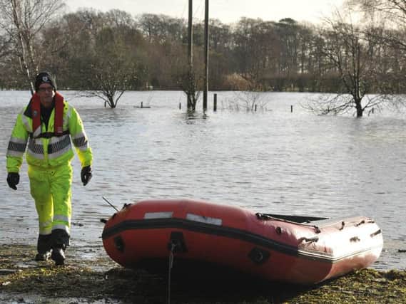 Emergency services, the Environment Agency and councils joined the clean-up operation in St Michaels after flooding forced people to flee their homes