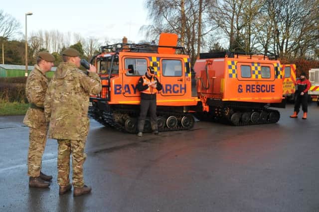 The army helps with the flooding clean-up in St Michaels