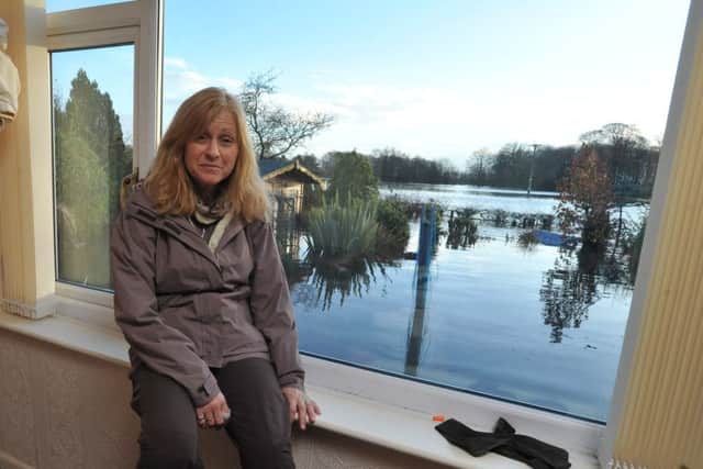 Julie McCord in her bedroom following the flooding in St Michaels