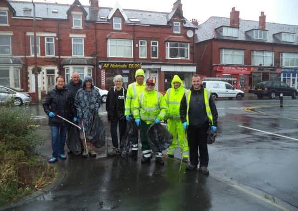 Members of the Fylde Litter Action Group tidying up in St Albans Road, St Annes