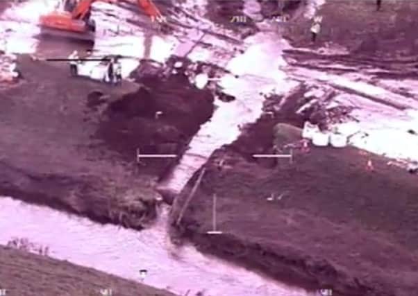 Footage taken from the police helicopter shows the damage caused by flooding in St Michaels