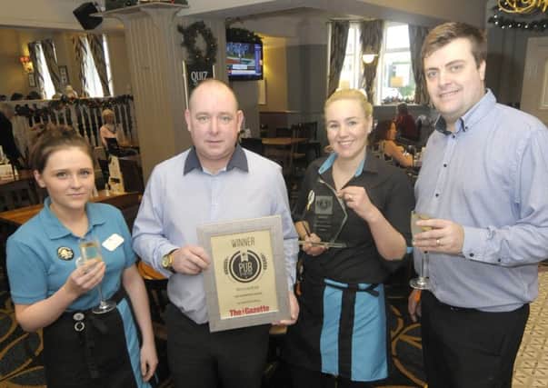 The Highfield has won the Gazette Pub of the Year.  Pictured, left to right, are Joanna Eaves, Sean Lithgow, Della Lithgow and Aaron Johnson