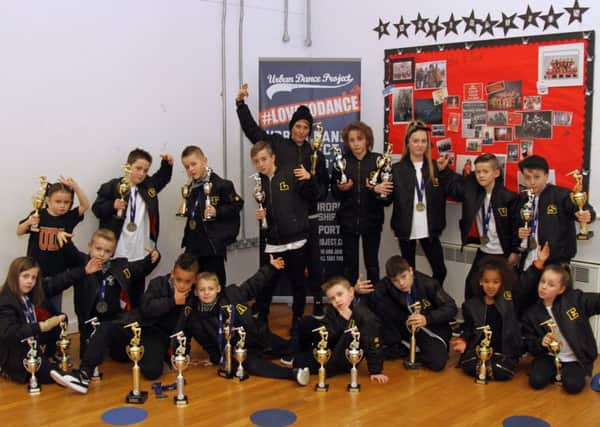 Dance Academy at Unity Academy Blackpool.
Urban Dance Project have won a record number of trophies.  Pictured are the dancers with their trophies.