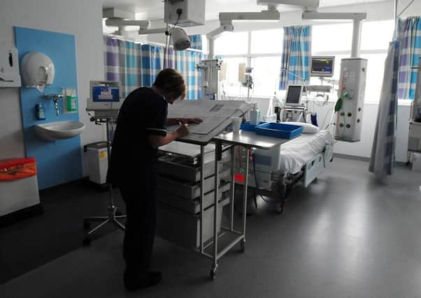 A nurse on a ward at a hospital. Photo: Rui Vieira/PA Wire