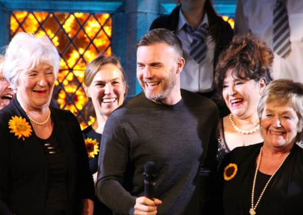 Gary Barlow with some of  The Girls