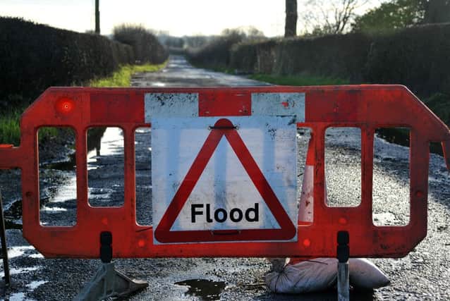 The Lancashire village of St Michaels and surrounding area was again affected by flooding following Boxing Day's record-breaking rainfall.
Sowerby Road closed off.  PIC BY ROB LOCK
27-12-2015