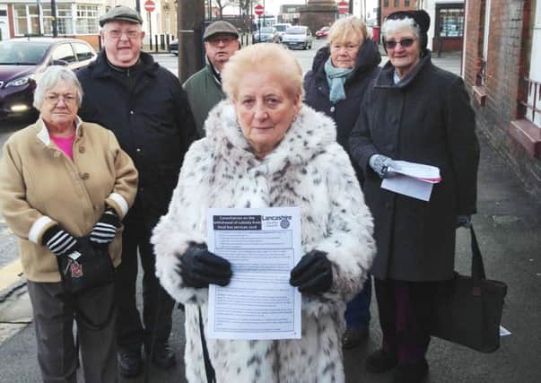 Anglea Patchett (centre) is petitiioning to stop cuts to bus services. Pictured with her from left are Audre Haughan, Stanley Baines, Graham Crow, Gail Fisher and Norma Watkin.