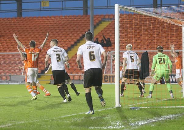 Blackpool's players appeal for a penalty against Port Vale last weekend