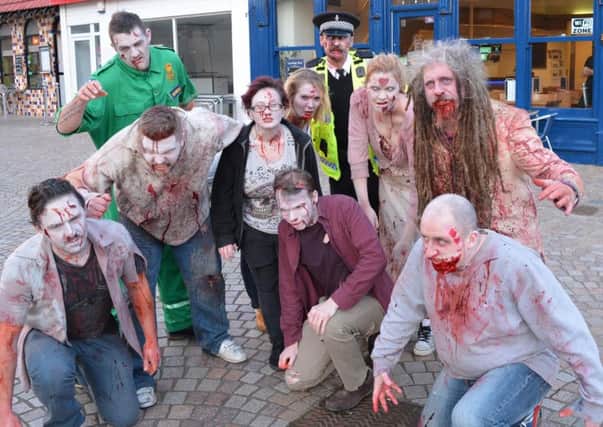 Scenes in St John's Square, Blackpool, for a Channel 4 online short about Jason Redshaw's hobby of role playing as a zombie.