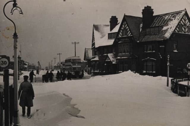 The Halfway House, Squires Gate Lane, South Shore, Blackpool. Snowdrifts cover the road, in 1940