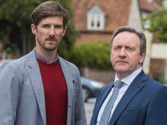 Neil Dudgeon (right) as DCI John Barnaby and Gwilym Lee as DS Charlie Nelson in Midsomer Murders