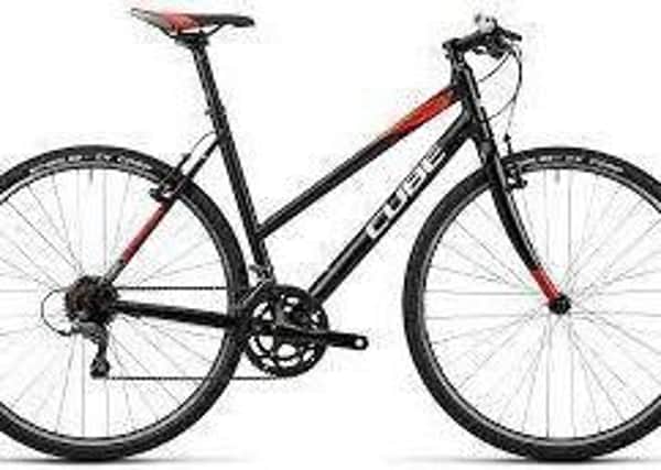 The black and red Cube bike, similar to this one, is worth Â£1,200 and was stolen from a garage in Poulton