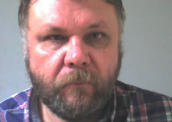 Andrew Threappleton was jailed for filming schoolgirls on his mobile phone.