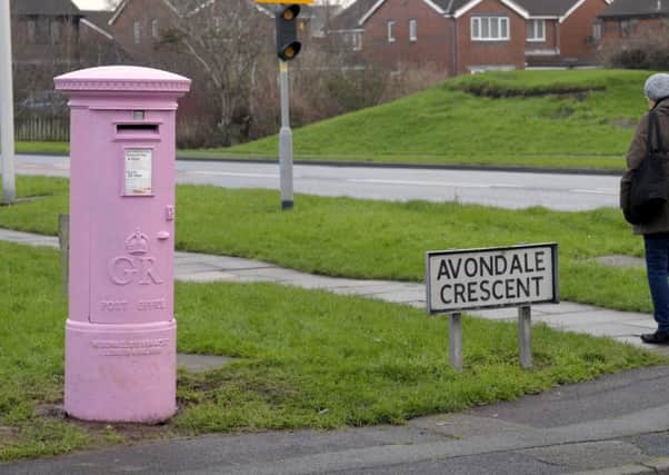The pink post box on Avondale Crescent, close to Highfield Road