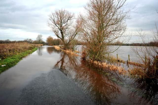 Flooding near Inskip, after Storm Desmond caused the River Wyre to breach its embankment