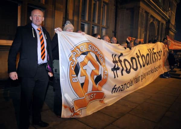 Members of Blackpool Supporters Trust and fans of Blackpool FC protesting outside Blackpool Town Hall