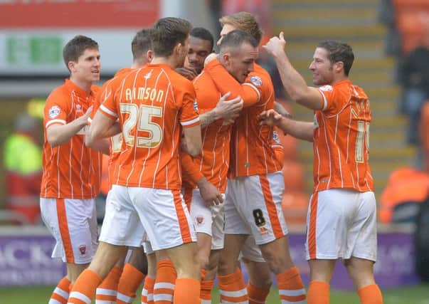 Blackpool's players celebrate during last weekend's 5-0 win