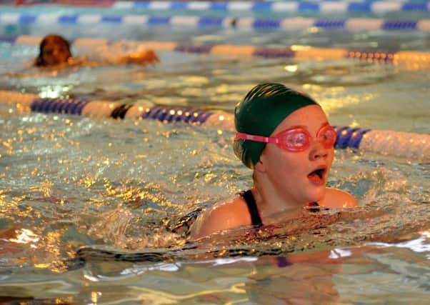 Abigail Scarr from St Bede's, Lytham taking part in the 2015 Lions Swimarathon