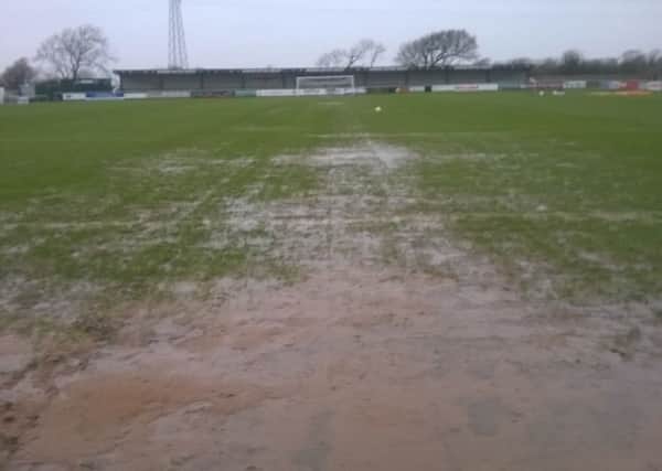 Fylde's waterlogged pitch on Tuesday