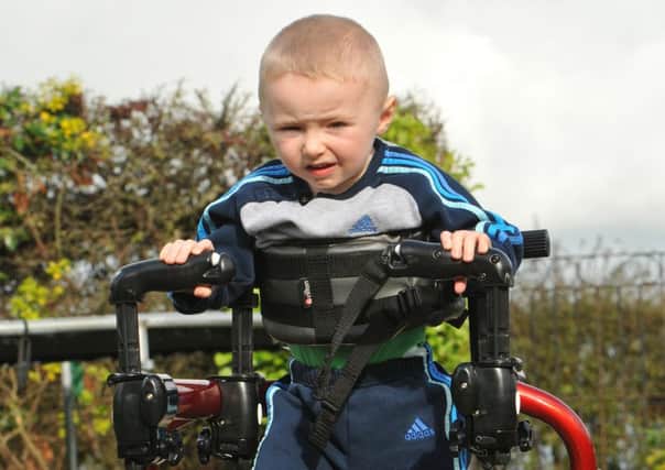 Kaason Ogden, who has cerebral palsy