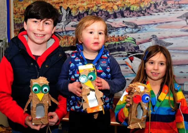 Finlay, Teddy and Daisy Stein with their creations