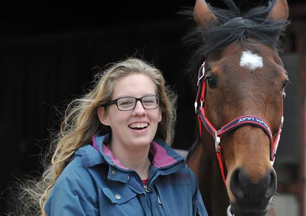 Elle Hewitt is through to the finals of the Junior Miss North West beauty pageant, but her ambitions lie beyond the catwalk to the slightly less glamorous surroundings of stables, as she hopes to become an equine vet.
Elle with her horse Rummy.  PIC BY ROB LOCK
25-1-2016