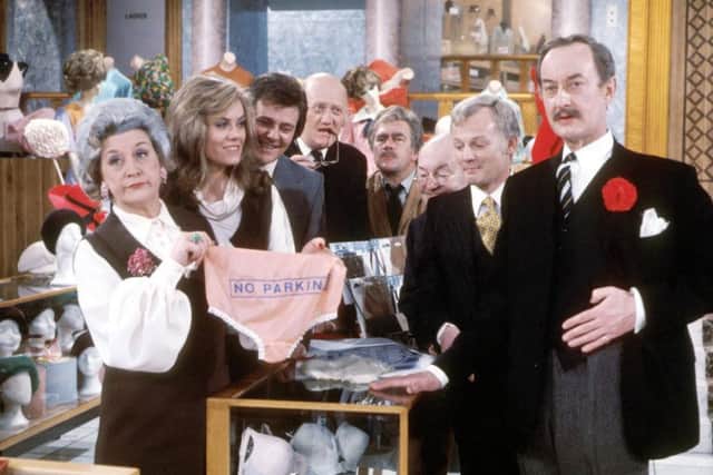 The iconic TV star played camp shop asst Mr Humphries (second from right) in Are You Being Served?