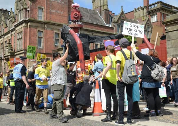 Protestors outside County Hall Preston for the County Council's planning hearing into the two fracking bids on the Fylde