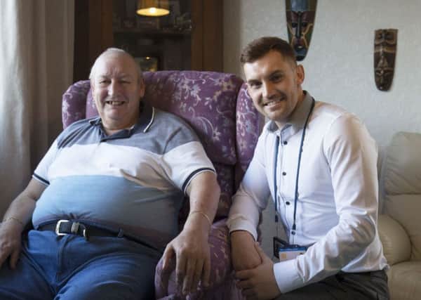 Stuart Bradley, a retired firefighter and professional rugby player, now has multiple health issues and struggles to get out of his flat but a new health service is helping him get back on his feet. Stuart is pictured with wellbeing support worker Lee Jones