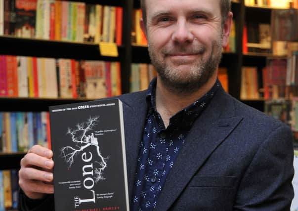 Andrew Hurley with his novel