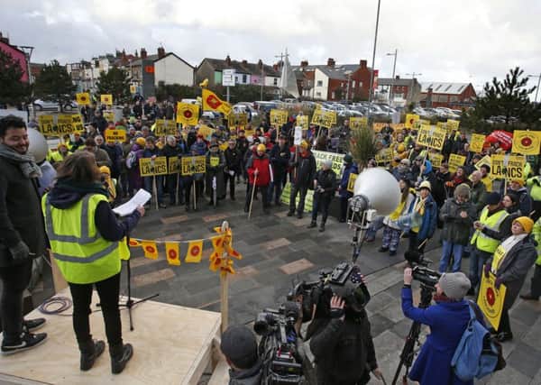 Anti-fracking protestors outside Bloomfield Road, the home of Blackpool football club in Lancashire, where the Planning Inspectorate inquiry was due to begin into the decision last June by Lancashire county councillors to reject proposals by energy firm Cuadrilla for exploratory drilliing for shale gas at two sites in Roseacre and Little Plumpton.Photo credit: Peter Byrne/PA Wire