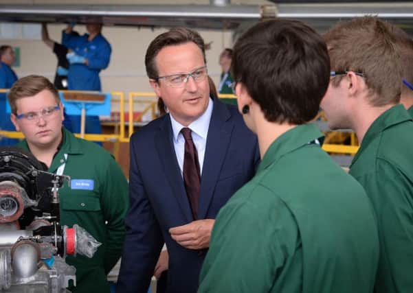 David Cameron talks to apprentices, for which Brian Crawford has praised the Conservative government