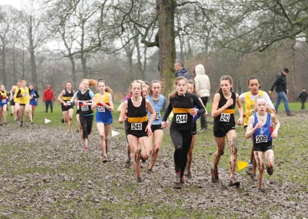 Fylde runners Caitlyn Preddy, Danielle Whipp and Darcy Lonsdale in the junior girls race