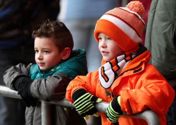Two young Blackpool fans at a recent game