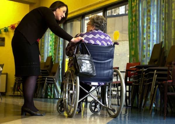 PIC BY ESME ALLEN FOR STOCK
Nurse in a care home talking to an elderly woman in a wheelchair
PENSIONS, PENSIONERS, POVERTY, OLD, AGEING, POOR, BENIFITS, SOCIAL SECURITY, CARING, DISABLED, CAREERS, VOLUNTEERS, HOUSING, RETIREMENT