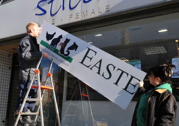 Photo Neil Cross
Jenson Turley and Debbie Stannard of Easterleigh Animal Shelter turning an old clothing shop into new charity shop in Abingdon Street, Blackpool