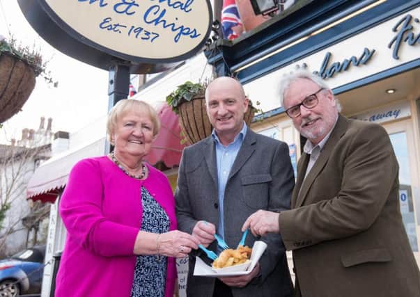 Roger Mc Cann with Tom and Johanna McCreedy of Whelans Restaurant
