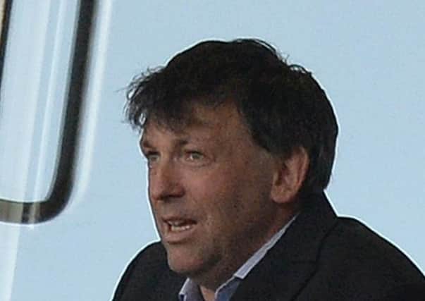 Blackpool chairman Karl Oyston watches Saturday's game