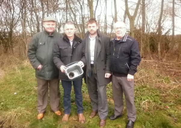 Couns Michael Mcloughlin and Lawrence Hunt with Peter Rutter from the Safer Places team and coun George Davies on site