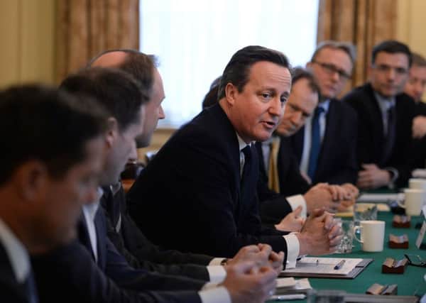 Prime Minister David Cameron (4th left) chairs a meeting of business leaders at No 10 Downing Street in London to discuss mental health issues in the work place. PRESS ASSOCIATION Photo. Picture date: Monday February 15, 2016. The Prime Minister has said he is "committed" to putting mental and physical health care on an equal footing in response to a report on the future of mental health services. See PA story HEALTH MentalHealth. Photo credit should read: Stefan Rousseau/PA Wire