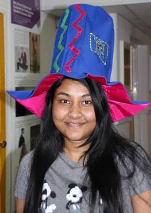 Poco..Blackpool and The Fylde fashion studen Bhagya Hefhani with hat she designed for Poco Loco