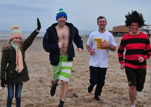 Photo: David Hurst
Fleetwood Sea Dip. 
Organiser, Phil Gibson, Barry Whittaker and Neil Hendry are set off by Izzy Hendry the inspiration for the dip who suffers from Cystic Fibrosis