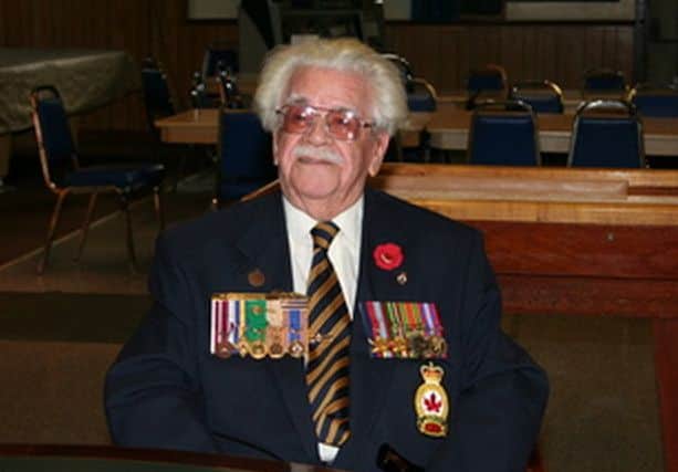 Charles Rodaway with medals awarded by the British and Canadian army