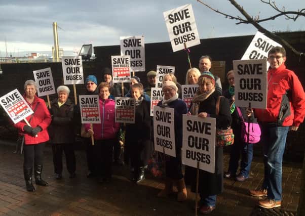 Bus protesters outside County Hall, Preston, ahead of a budget meeting