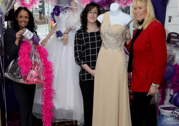 Lisa Brownless, Kelly Stott and Jean Leach of Heaven And Hell, Coronation St, Blackpool, are raffling off a wedding dress and bridesmaid dresses to raise money for Pancreatic Cancer UK - Lisa lost her mum to cancer last year.