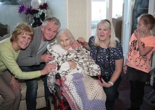 Isobel Bee celebrates her 100th birthday at the Fairhaven Care Home in Fleetwood, with members of her family. From left: Pam Jones (Isobel's great niece-in-law), Brian Jones (great nephew), Isobel Bee, Lorraine Spencer  (daughter), Amelia Spencer (great granddaughter).