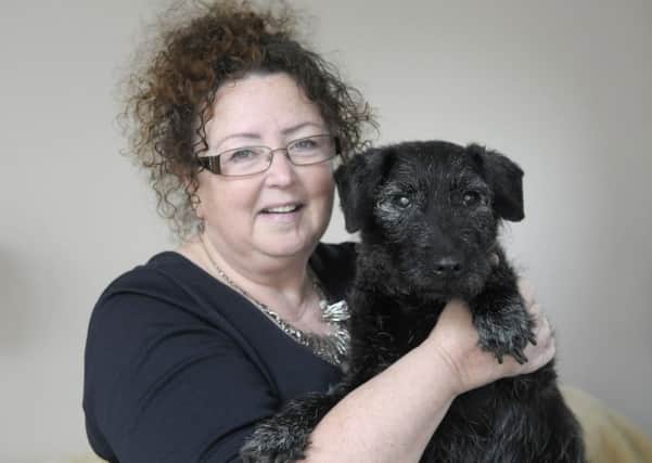 Susan Christian is now the proud owner of Benji, one of the dogs at Easterleigh Animal Sanctuary.